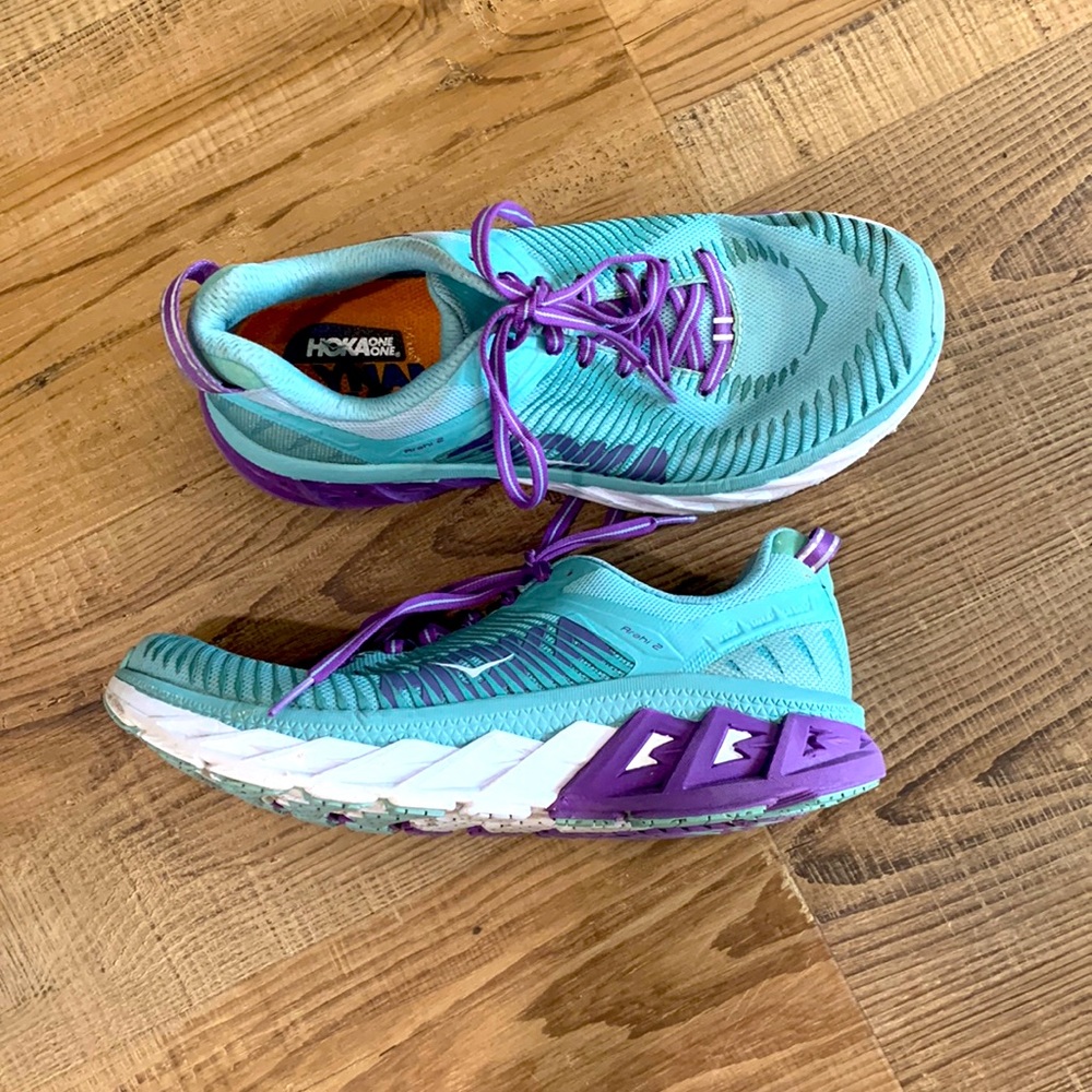 Hoka tennis shoes. Size 8 turquoise and purple. Worn only to run a few times.